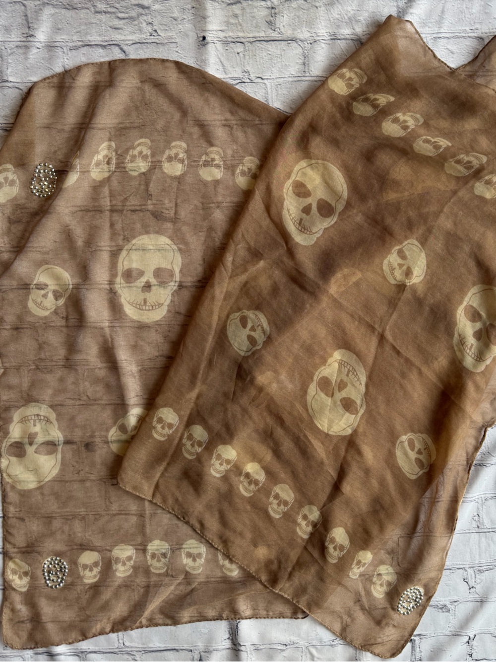 Beautiful lightweight skull print scarf in a soft taupe/beige tone with cream